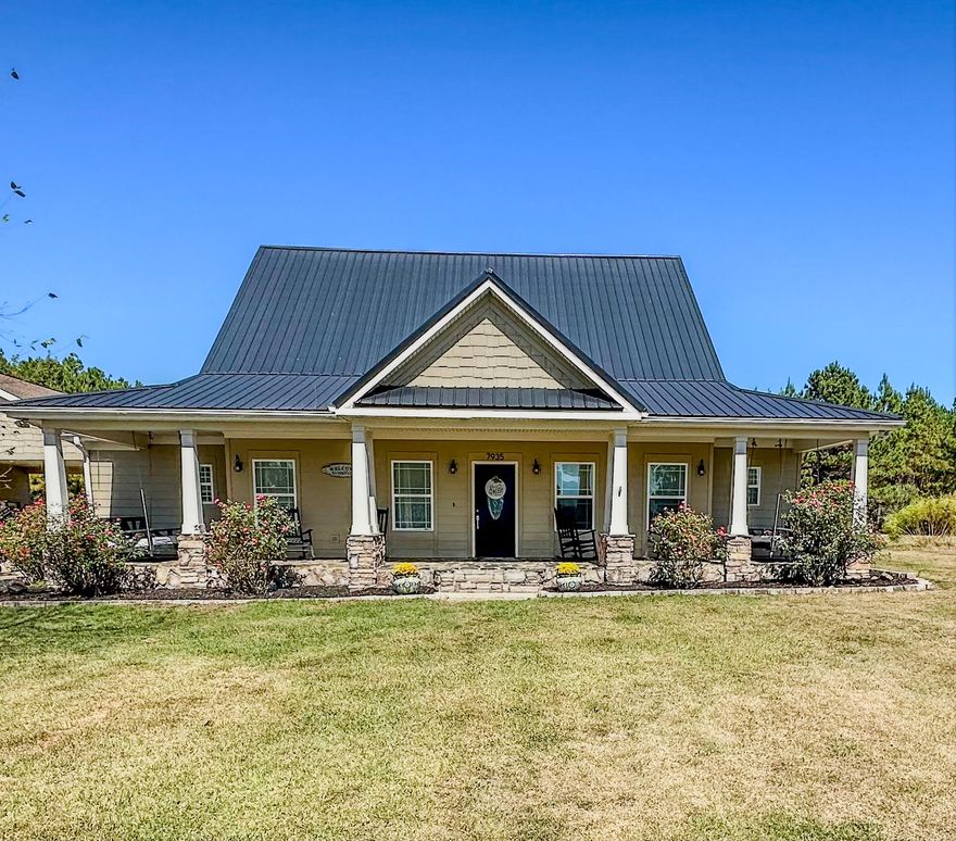 Open house 10/25 & 26 1-3p.  Luxury country living!! Easy commute to beaches, bases and shopping centers. This home has 4 bedrooms, 2 bathrooms, over 2800 sqft of living space, under a metal roof with 10 acres.  One car garage/shop with covered oversized car port that also has a 30amp power hookup. Inside the home you will see, hand scraped 3/4'' solid oak floors in the living room, dining room, hallway and foyer. Primary bedroom has 2 walk-in closets, large walk-in shower with dual shower heads.  Custom cabinets throughout home with 12'' inch crown molding.  The kitchen has a huge island with an exquisite stone wall.  Outside is a LARGE wooden deck.  Custom free form gunite pool with tanning ledge, extended pool decking and gazebo (w/ electric).