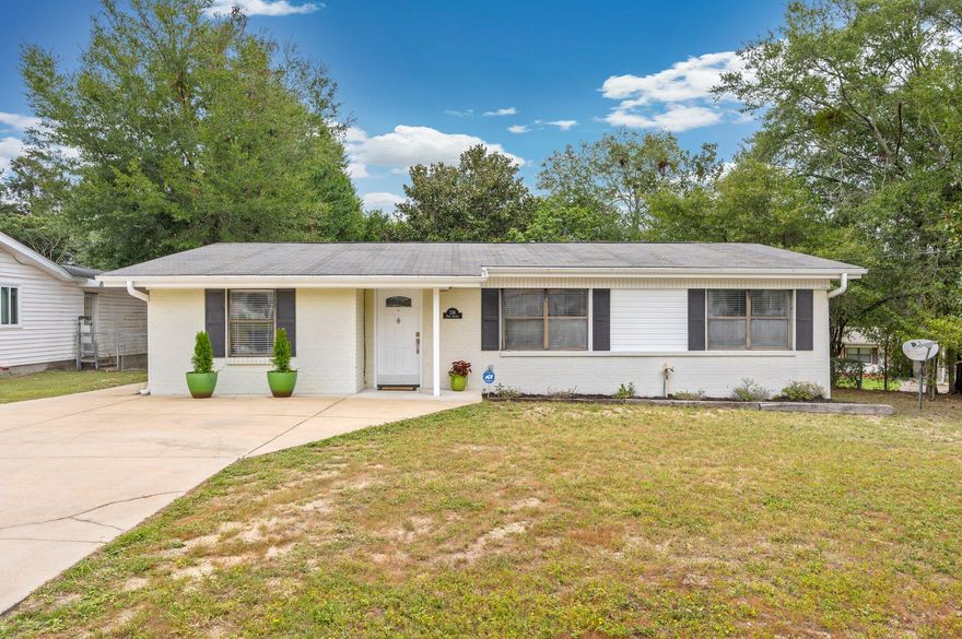 Check-out this charming Florida home. Step inside and be greeted by an updated living spaces & kitchen. The large fenced lot provides ample outdoor space for entertaining or simply enjoying the beautiful Florida weather. But that's not all - an enclosed Florida room adds even more space to this already generous home. The BONUS room is versatile and can serve as a bedroom or a family room, giving you the flexibility to create the perfect space for your needs. Plus, one of the bedrooms features a professionally built-in desk/office with a Murphy bed - ideal space for a home office or guest room. But it's not just the home itself that makes this property special. Valparaiso  offers a plethora of advantages: easy/quick access to Eglin AFB, schools, parks, boat ramps & restaurants.