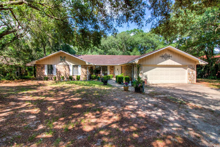 You are going to fall in love with this lovingly maintained 3 Bedroom, 2 full bath brick ranch style home in the desirable Kenwood subdivision. This large 2,385 square foot home is situated on an oversized .65 acre property on quiet Troy Circle with beautiful mature shade trees. All the rooms are very spacious. The kitchen and living room are open concept- perfect for entertaining. You also get an additional 2 rooms- a formal dining and living room! Out back you will find a large screened in porch to keep you cool all summer. The driveway is oversized, allowing for additional vehicle or boat parking. This home has been in the same family since it was custom built in 1982. Make sure you make an appointment to view this special home asap.