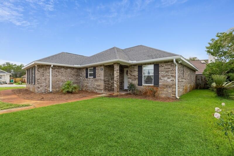 UNDER CONTRACT...TAKING BACK-UPS!Seldom Listed Indian Estates Home! Custom built in 2013, this well-designed Destin home has so many great features that you will just have to come see it. New gorgeous blonde LVP flooring and fresh paint! Interior brick wall with built-in wine bar brings the feel of Napa Valley into the open living/dining/kitchen area of the home. Change it to a coffee bar easily by removing custom shelving. The kitchen is a cook's dream with granite counters, beautiful wood cabinets, and stainless steel appliances and a huge walk-in pantry. The breakfast bar connects the dining area where many can enjoy eating and gathering together.