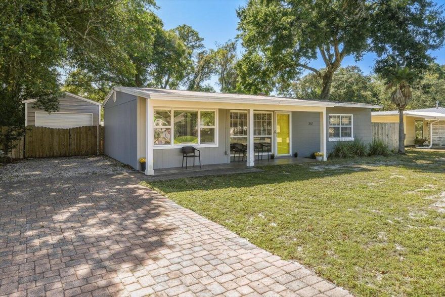 WOW Gorgeous updated home in the highly desirable neighborhood of Elliott Pt! You don't want to miss out on this 3 bd/2 ba home! Only 1 block to the Choctawhatchee Bay, less than 2 miles to the beach and only a golf cart ride away from Historic Downtown FWB.  Large open kitchen with large island, espresso cabinets, granite countertops, with stainless steel appliances. Travertine tile flooring throughout the kitchen, dining, bathrooms, hallway and laundry room, and hardwood flooring in the bedrooms. The Primary bathroom has a walk-in travertine tile shower with pebble stone floor with mosaic accents and a large walk-in closet.  Unwind and relax in your private backyard oasis, that features a paver patio with a pergola and a Hybrid Gunite pool with a chiller and heater with lush landscaping Effective Year Built is 2010! All copper wiring. 1 car garage. HVAC was replaced in 2024. Water heater in 2023. Yard building/workshop in back corner has power and its own breaker box. Nice back deck with beautiful brick pavers leading to your private oasis to relax and unwind in your private pool. Pool and equipment has 8 years left on the warranty and is transferable to the new owner. Lg privacy fenced backyard w/ a sprinkler system on a timer w/ a well for easy lawn care. Decorative brick pavers in the driveway w/ extra parking & double gate on both sides of the home.  Call to see today & make this your little piece of paradise!