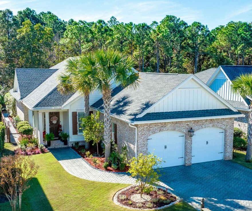 Don't look further! This 3 bed/3 ba home is beautiful with LOTS OF UPGRADES in the gated golf community of Emerald Bay. Being situated on a dead-end street makes it very private and secure. The custom home offers a large open floorplan with 10 ft ceilings in kitchen, dining and living area and 9 ft ceilings in bedrooms, big kitchen island, crown molding, quartz counter tops, maple hardwood floor, lush carpet in the bedrooms. Additional upgrades are plantation shutters, an upgraded dining area with built-in cabinets as well as a custom-built coffee station and added shelving in the laundry room. The fenced in yard is also immaculate with brick patio, lots of plants and a HUGE screened in porch with porcelain tile - serving as your extra living and dining area.
