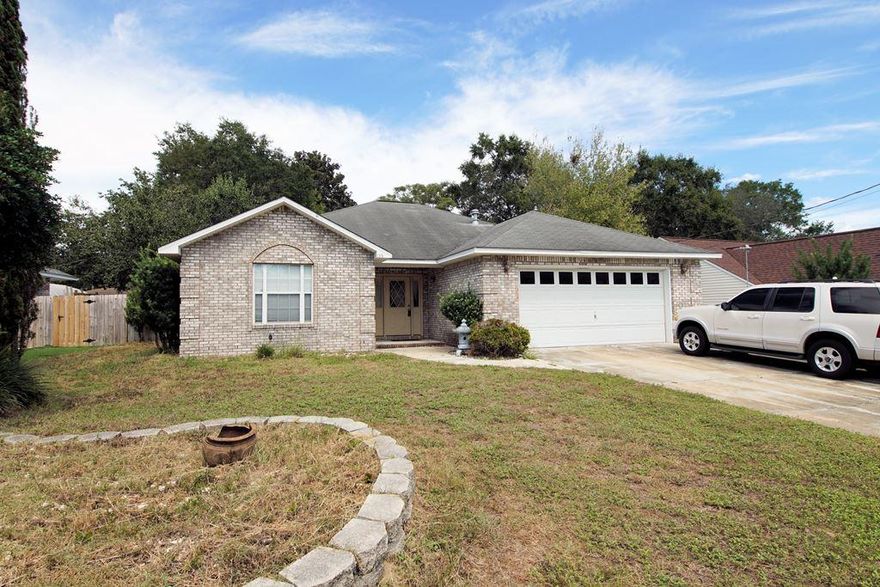 Nicely updated home in Valparaiso close to the East gate of Eglin AFB! This home is MOVE IN ready with a kitchen updated with granite counters and stainless appliances, baths update with granite counters, hardwood flooring and new paint. The open floorplan also features a sought after split bedroom plan as well. The deck along the back of the house is equipped with a hot tub (offered in ''as is'' condition) and the back yard has plenty of room for kids and pets. Look no further, you have found your new home!