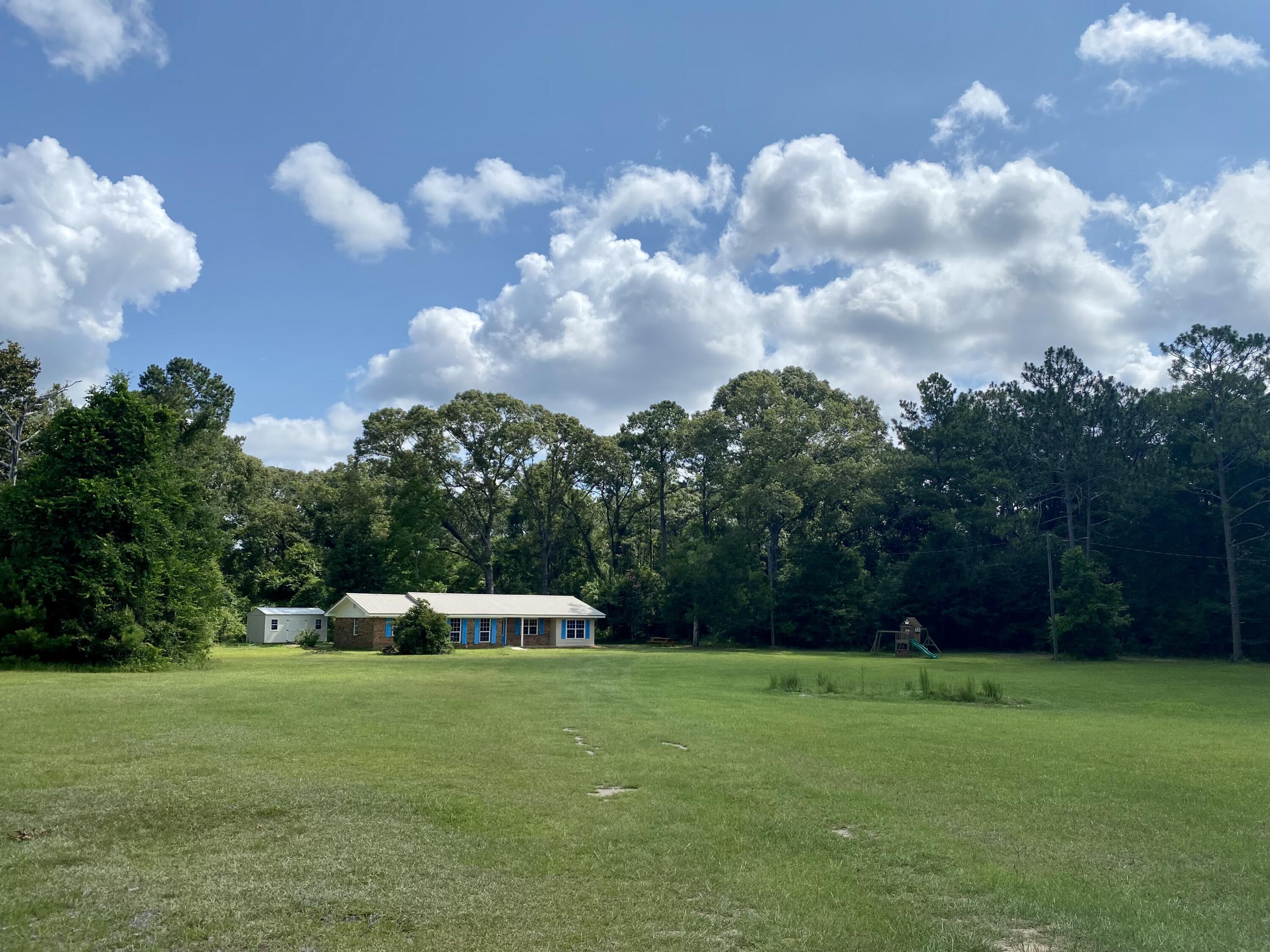 As Okaloosa county continues to grow, it also maintains hidden gems such as this property. Just outside of the city limits of Crestview lies a remodelled home on 1.5 AC. This 4 bedroom, 2 bath home is ready to welcome the next family with all new luxury vinyl plank flooring, fresh paint, completely remodelled bathrooms, newer appliances, and new roof just over a year old! The front yard is spacious for barbecues, at home football games and so much more!
