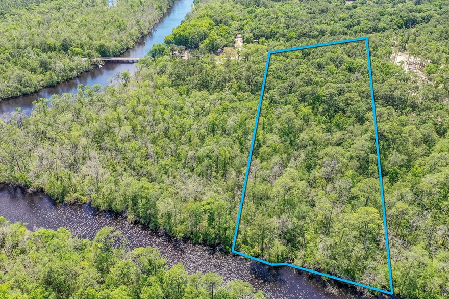 This extraordinary parcel  is approximately 6.7 acres, just minutes from Highway 331 and offers 300 feet of waterfront along Black Creek. An ideal location for living life on the water. This parcel located less than 20 minutes from the beaches of South Walton and all that the Emerald Coast has to offer. Buyer to verify all land use and property dimensions.