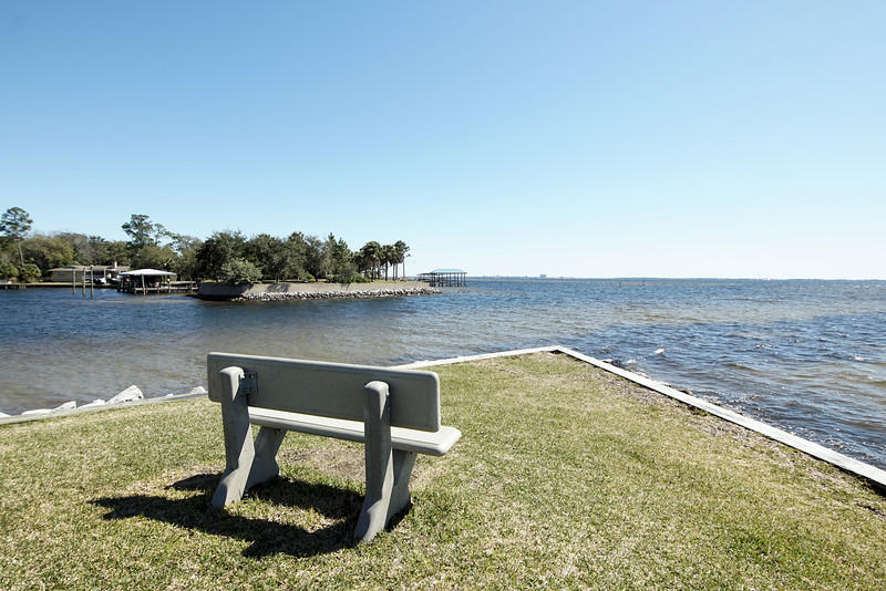 Attention to detail is evident in the sought after gated community of FinisterrA. Located on the Choctawhatchee Bay, across the street from Shalimar Yacht Basin. This 2 bedroom/1 bath unit is well maintained and features granite counter tops and ceramic tile flooring. Gated complex includes an in-ground swimming pool, tennis courts, laundry facility, kayak racks and a clubhouse. Only a five minute drive to Eglin AFB's main gate.Note to investors Finisterra can be rented.