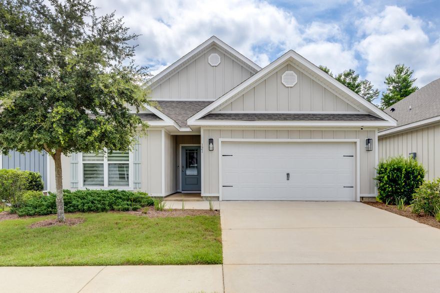 Seller will pay the remainder 2025 HOA Dues! STOP the search, this is THE ONE! 4 bedrooms, 2 bathrooms, and great BONUSES! Freshly painted in August 2025 (that's right, new!), carpets professionally cleaned so you can move in mess-free, washer & dryer included, PLUS an Aqua Pro water filtration system already installed.. that's pure, clean water on the house! Upgraded fixtures in the living room and bedrooms, custom blinds with remote controls, and not one but TWO closets in the master bathroom! And here's the kicker..you're just steps from the community pool! Enjoy soaring 9' ceilings, luxury vinyl plank flooring throughout the common areas, plush carpet in the bedrooms, stainless steel appliances, beautiful painted white cabinetry, and a designer lighting package with sleek LED fixtures in the kitchen and bathrooms. living in Firefly comes with a treasure trove of perks including: a private clubhouse with multipurpose room and fitness center, gated entry, community pool, dog park, tennis courts, and miles of walking and biking trails. And here's the real bonus: Firefly sits inside the larger master-planned community of Hammock Bay, giving you full access to its incredible amenities 3  resort-style zero-entry pools, a 10,000 sq. ft. clubhouse, rentable event center, lap/play pool, pickleball, basketball, tennis, movie theatre, scenic trails, massive playground, sports complex, on-site HOA team, Elementary School, General store, 24/7 security guards and The Bay Club  a stunning bayfront clubhouse with a 500-foot dock on Choctawhatchee Bay.