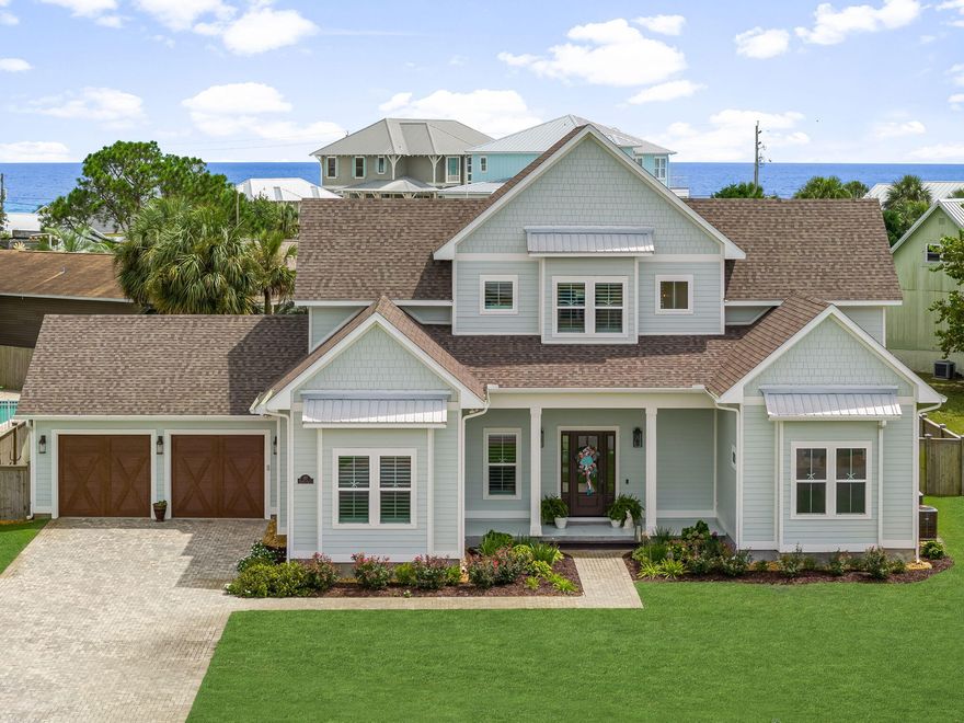 Luxury Coastal Retreat Home for Sale in Panama City Beach, FL. Experience the ultimate beach lifestyle in this stunning custom-built home on Panama City Beach's quiet and desirable West End. Completed in 2021 by acclaimed builder Rick Koehnemann of Koehnemann Construction, this 4-bedroom, 4 1/2 bathroom home combines timeless craftsmanship with modern amenities, offering both luxury living and exceptional rental potential. This home was designed for Comfort, Relaxation & Entertaining! Just a few houses from the beach on an oversized lot, the property provides abundant outdoor space with room to design your own swimming pool. A fully fenced backyard with privacy fencing and beautiful, mature landscaping creates a sense of comfort and seclusion. A back gate leads to a short walk over the