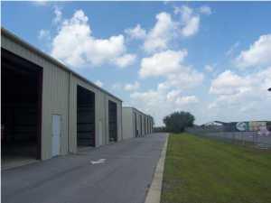 Commerce Lane is located in South Walton's Industrial Complex. This listing represents 3450 square feet flex space model with (2) 14 foot roll up doors, his and her bathrooms (if needed), h/c office space is approximately 1050 to 2000 sqft feet (split level), and 2400 sqft of warehouse space.