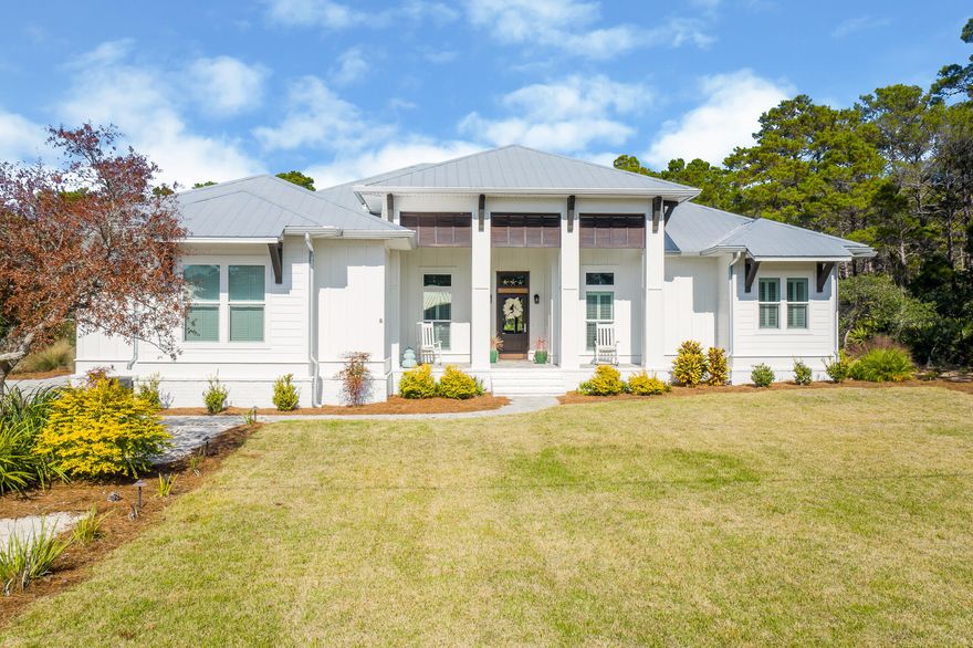 A gorgeous 4B/4B custom built home located less than 1 mile from the Gulf of Mexico on the West end of 30A.  Take a short golf cart, bike ride or walk to 30A, just north of Gulf Place, Shunk Gully and Ed Walline beach access.  Built in 2019 as a primary residence, this home is in excellent condition.  The floor plan is split level with ample storage.  Oversized 2 car garage with separate golf cart garage and storage.  The master and two bedrooms have en suites.  Two large walk in pantries.  Spacious back porch with dining table, wood burning fireplace, TV and fans will allow you to enjoy outdoor living in all seasons.  There is room to build a pool.