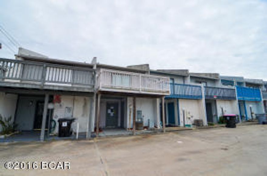 : This town home has an awesome location. It is just 1 Block to a deeded beach access. There is a Gulf View from the Deck. This unit has a patio off of the living room area and a front deck off of the master bedroom and a back deck off of another bedroom. There are plenty of bathrooms for the whole gang and 2 nice large bedrooms and another smaller bonus room that is perfect for a bunk room There is a full bath as you enter the property along with a washer area so you can rinse off when you come home from the beach. This town home complex consists of 7 town homes. No HOA fees! This home will make a great beach rental or a beach get away. There are restaurants, shops and entertainment in walking distance .