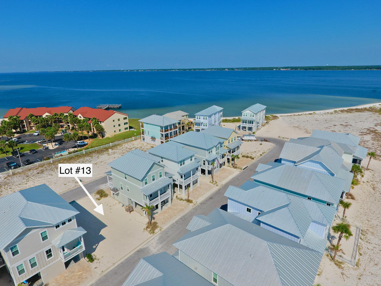 Located in the gated community of By the Sea with community pool and community access to the Santa Rosa Sound with Easy access to the Gulf of Mexico beaches, bike and walking paths, and more make this one of the best lots that is currently available. Navarre Beach is one of the last places in Florida with the Old Florida feel with quaint beaches. Miles of walking and biking paths, crowd free beaches, Navarre Beach fishing pier, Gulf Islands National Seashore is to the West, and the Navarre Beach county park is to the East. This lot is the best place to build your dream beach home!