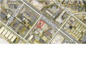 Vacant commercial lot located on busy corner. Many opportunities exist on this property for a commercial building with 50 feet of frontage and 100 feet of depth. This lot can be purchased at a low price per frontage foot and is prime for commercial development. Go show, bring offer.