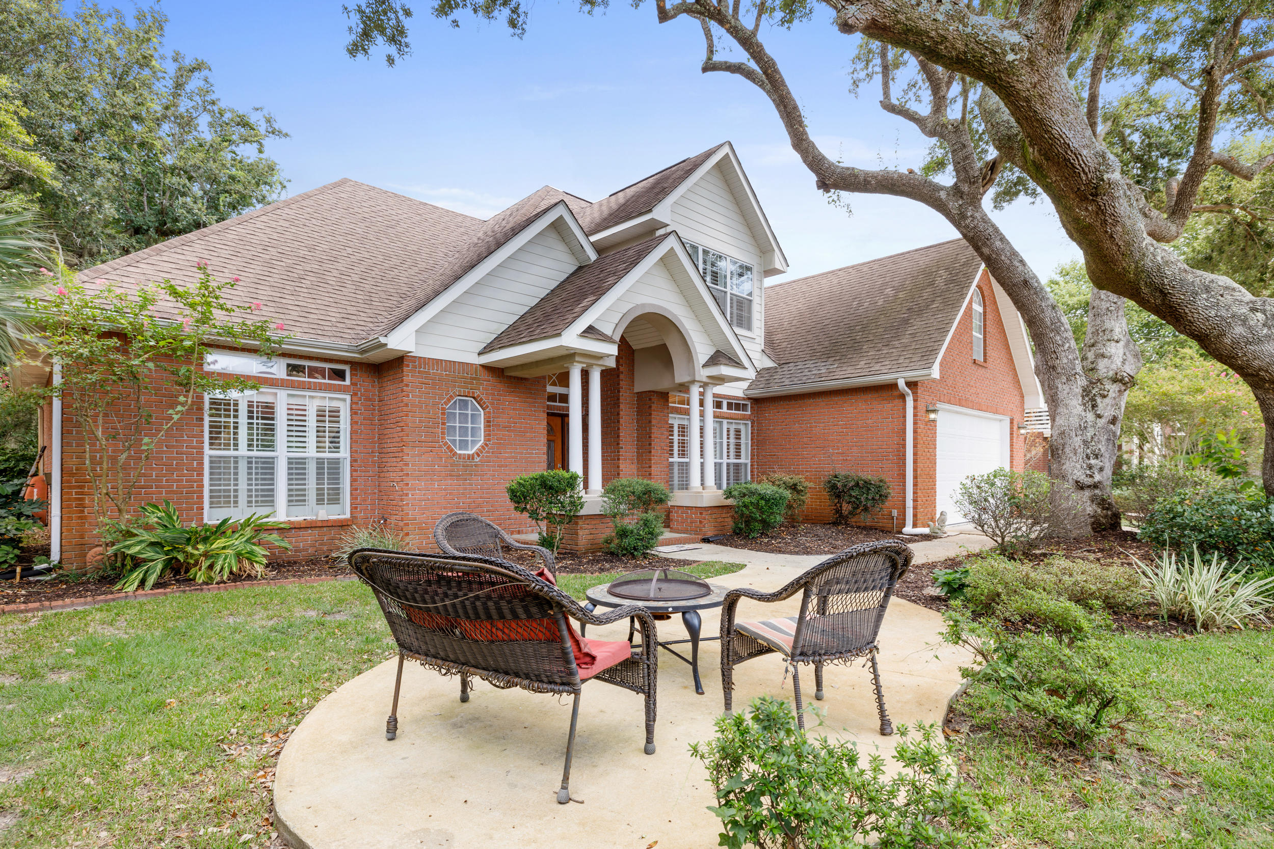 Gorgeous and well maintained home in a Waterfront Community with access to Santa Rosa Sound, this was a Parade of Homes Winner in 2001. 3 Bedroom plus large Bonus Room, 2 1/2 Baths, located on a cul-de-sac. As you enter the home, you will note the spacious foyer and great room with vaulted ceiling and wood burning fireplace. Cooking will be easy in this open style kitchen with custom cabinets, large prepping island, recessed lighting and crown molding. All Stainless Steel kitchen appliances convey installed in 2017. Solid Surface counters w/built-in corian sink and lots of light. Enjoy the spacious dining room with trey ceiling, chair railing, crown molding, recessed lighting, hardwood floors and plantation shutters. Huge Laundry room with utility sink, pantry and oversized counters.
Master Bedroom Suite continues with trey ceiling, and his/her walk-in closets. Master Bath has marble dual vanity, separate shower with seat, HUGE Jacuzzi Tub, lots of natural light and separate water closet. Upstairs, there are 2 bedrooms and 1 full bath. As well as a Spacious Bonus Room with laundry shoot and extra attic storage. The 2 car garage has recently added storage shelving, service door, remote garage door opener (new in 2018). The front yard features large Oak Tree were you can enjoy a fire and the sound breezes. Backyard area has a BBQ Patio for your cookouts. Fire pit, and beautiful Oaks & Magnolias Trees surround you. Deeded water access with Community Pier available with Pass Code. This home is convenient to Hwy 98, grocery stores, shopping, beaches, and Hurlburt AFB.