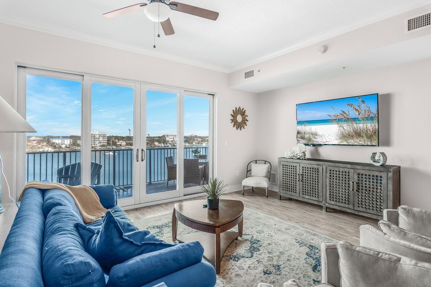 This 2-bedroom Harbor-front condo affords its owner exceptional views of the Gulf, Harbor and Destin's East Pass. Located in Harbor Lights, one of Destin's premiere buildings, you will enjoy the luxurious, private setting from this gated, low density condominium that prohibits short-term rentals. Interior features include: 10 foot ceilings, granite countertops, breakfast bar, crown molding, LVT flooring, Harbor-front Master bedroom, and an open floor plan perfect for entertaining. With 1,390 square feet of living area, this 2-bedroom  is more spacious than most. The open floor plan flows out on to an expansive private balcony that's an ideal vantage point to relax, dine, and watch the sun set over the harbor.