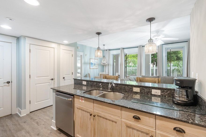 Step into instant vacation mode with this upgraded 1BR/2BA pool-level condo at Market Street Inn, highlighted by a rare, fenced large private patio for true indoor-outdoor living overlooking the lush amenity terrace. Perfect for entertaining or relaxing on your patio offering direct walk-out access to the infinity pool, hot tubs, fitness center, grilling area, and outdoor fireplace, no elevators, no hassle.Minutes from dining, shopping, and nightlife of The Village of Baytowne Wharf, this location is unbeatable. Inside features fresh paint, easy-care flooring, and stylish furnishings, and it's sold fully furnished and turn-key. Whether for personal use or a high-performing rental, this condo delivers prime location, resort amenities, strong income potential. It is a  slice of paradise!