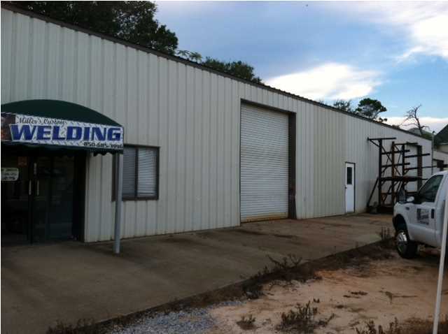 Excellent location and building for business that needs office, manufacturing, warehouse space and or service industry. Currently being used as a welding fabrication shop. Building includes 1 ton crane. Balance of equipment can be purchased separately. Property is situated on a corner lot with 50 feet of frontage on Mountain Dr. and 200 feet on Egret Ct.