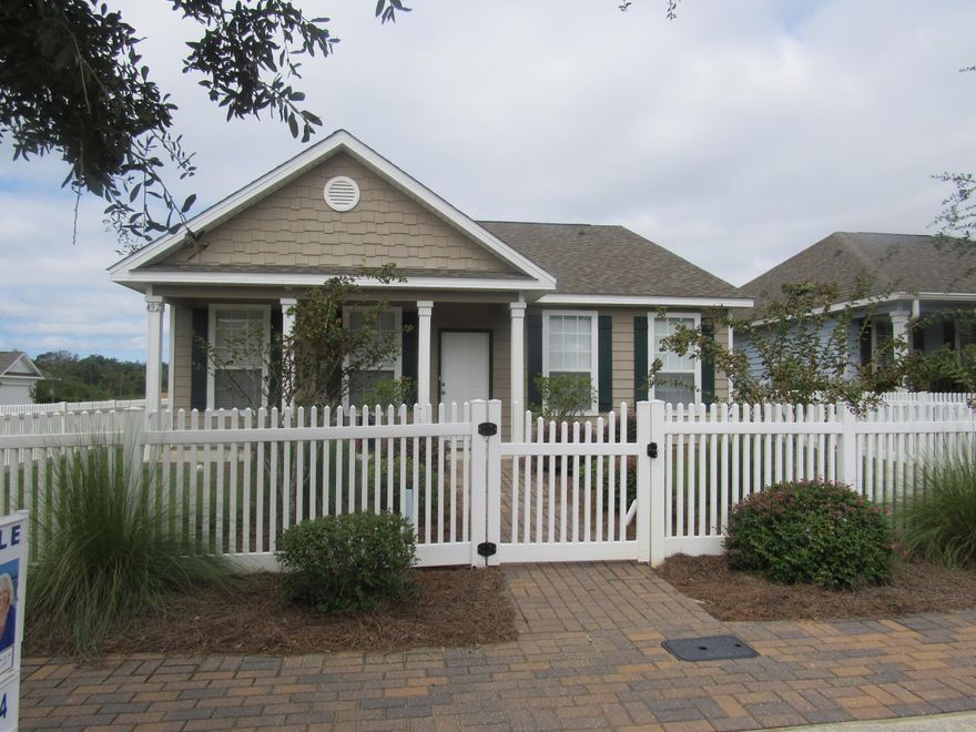 SELLER PAYS HOA DUES FOR THE ENTIRE FIRST YEAR!Hammock Bay 3 Bed 2 bath charming home that is fantastic condition and freshly painted inside. Carpet in bedrooms & ceramic tile in all traffic and wet areas, large family/living room and dining room, Kitchen has room for breakfast table or you could use dining room for 2nd living space. All GE appliances convey. Fully sodded yard, irrigation system. Parking in back and front of home up to 4 vehicles. HOA dues pay for extensive community amenities, cable and all your landscaping...not just yard mowing but all landscaping making it virtually maintenance free.Call Shirley or Steve to see this lovely home.