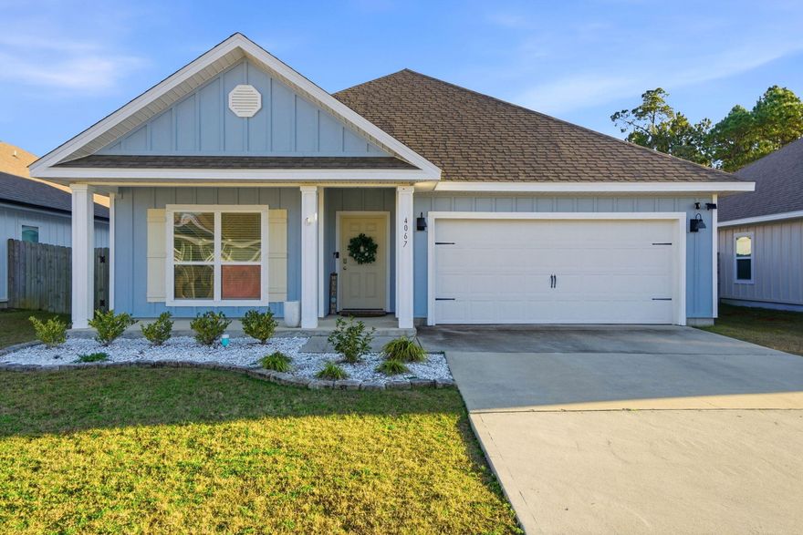 OPEN HOUSE! Sunday 2/1 from 1pm-3pm. Welcome to this 2021 Craftsman-style home in Arbor Place, a desirable Pace community with sidewalks, underground utilities, and street lights. This property stands out from the rest with a privacy-fenced backyard and a HUGE covered patio -- a rare find in the neighborhood and perfect for outdoor entertaining. The 4-bedroom, 2-bath open floorplan offers no wasted space, featuring trey ceilings and abundant natural light in the living room. The kitchen is designed for both function and style with granite countertops, stainless steel appliances, corner pantry, large island with bar seating, and a breakfast nook opening to the covered patio. Engineered vinyl plank flooring runs throughout main areas including two bedrooms and has