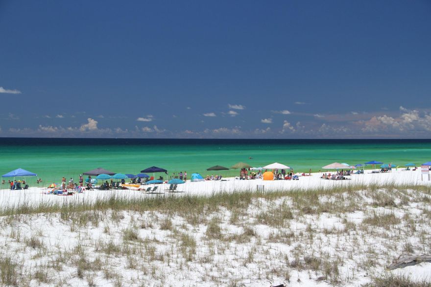 Cute 2 Bedroom 2 Bath unit located on the ground floor just steps from the beautiful white beaches of Destin!! Tile floors throughout and the windows were replaced in 2014. The unit comes fully furnished, per for second home or investment. The screened back porch is perfect for relaxing and is situated next to pick-nic grill area. Chateau La Mer is a deeded beach access community with private (gated) beach access. Located close to Shopping, Golf, Deep Sea Fishing. You can literally walk to beach front fine dining. Chateau La Mer also has multiple swimming pools, tennis courts, on-site management office, play ground, club house with full kitchen and laundry room. Truly a must see. Call for your private showing today.