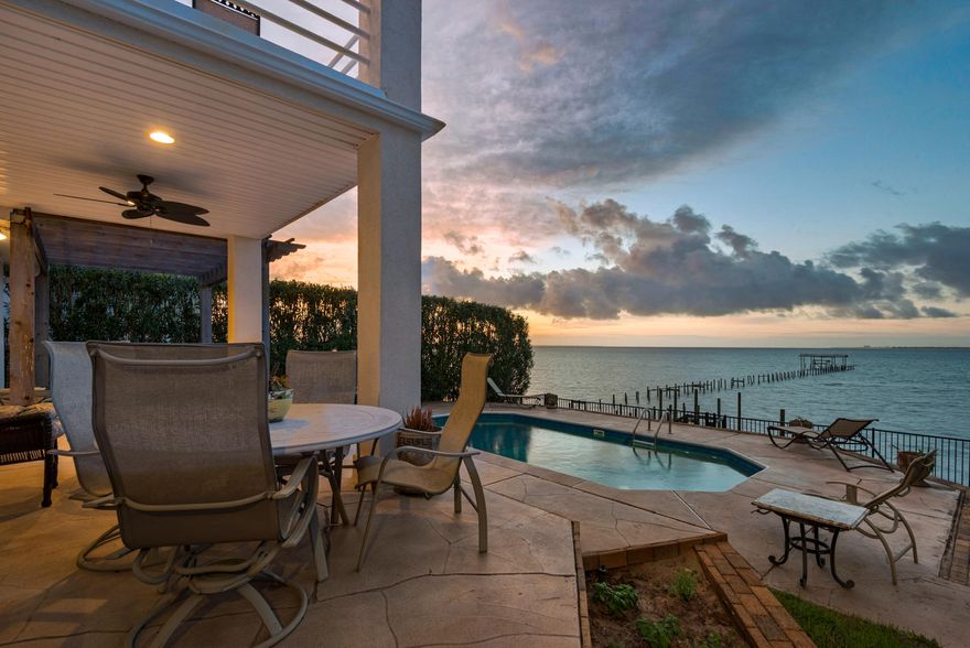 Ready for beautiful waterfront living??Front yard...9th Fairway of Shalimar Pointe Golf Course. Back yard...beautiful Choctaw Bay. The best surrounds this lovely home that is now available to be yours. Who can beat 23.4 feet ABOVE sea level??!! Two master suites; one upstairs, one downstairs. One year old roof with solar panels, in-line hot water heater, new pool liner and over-the-top gourmet kitchen. Whole house generator. The main level living area has been entirely opened up to include the dining area, living area, kitchen and office area.Washer/dryer included. Renovation details are attached to listing along with the survey. Bathrooms are currently being updated from the pictures on the listing.