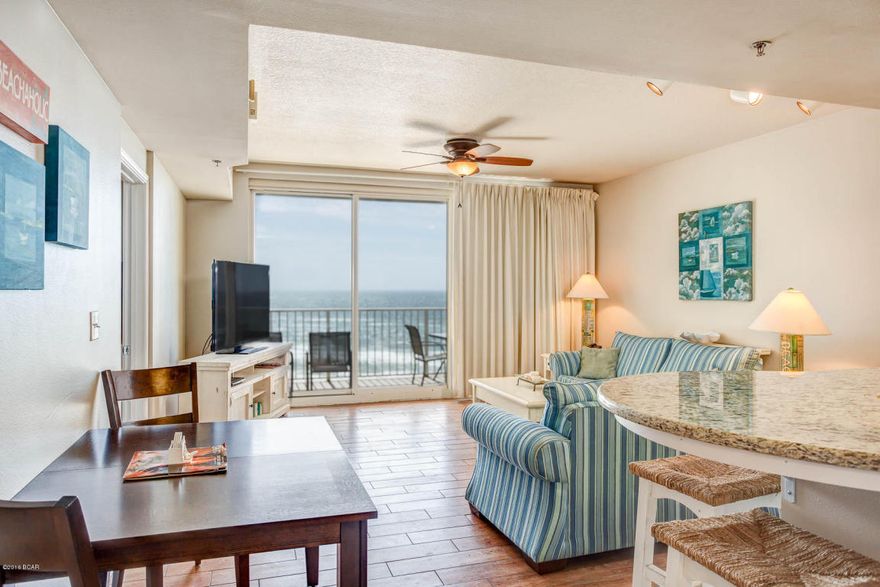 Don't miss out on this low floor, upgraded unit at the Shores of Panama. Shores of Panama 813 has been recently updated with new, thick granite counter-tops, backsplash, new paint throughout the entire unit, no carpet, new refrigerator, as well as some new linens and furnishings. This is one of the best floor plans on the beach. This unit features a beach front master bedroom, a large open living area and a bunk room. Unit 813 is located on the 8th floor which is ideal no matter if you are looking to rent, or live here full time! Shores of Panama features some of the best amenities on the beach including almost 500 feet of gulf frontage, 14,000 sqft lagoon-style pool, indoor heater pool, workout facility, day spa, tiki bar & grill and much more!!