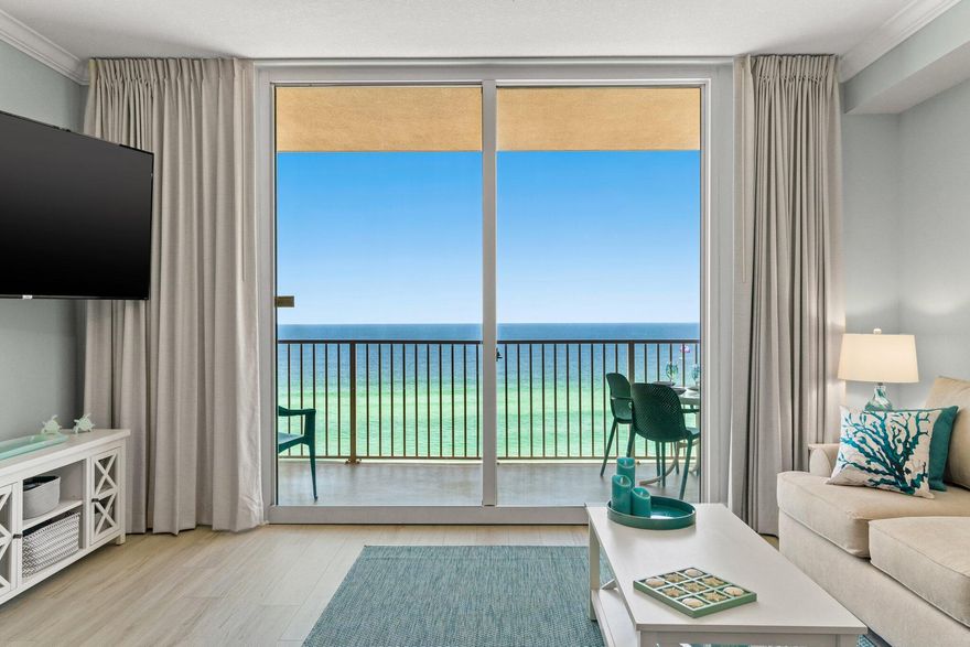 CURRENTLY UNDER CONTRACT, SELLER WILL CONSIDER BACKUP OFFERS Welcome to Tidewater unit 1005, one of Panama City Beach's most iconic resorts. This beautifully updated 2-bedroom, 2-bath condo spans 1593 square feet, offering one of the most desirable floor plans on the beach. As you enter, a spacious guest bedroom welcomes you with two beds to comfortably accommodate 4 guests, accompanied by a private bathroom.Moving down the hall, discover a large eat-in kitchen adorned with new stainless steel appliances and granite countertops--a perfect setting for family gatherings. The living room features a pull-out sleeper sofa, a dining area, and a flat-screen TV.