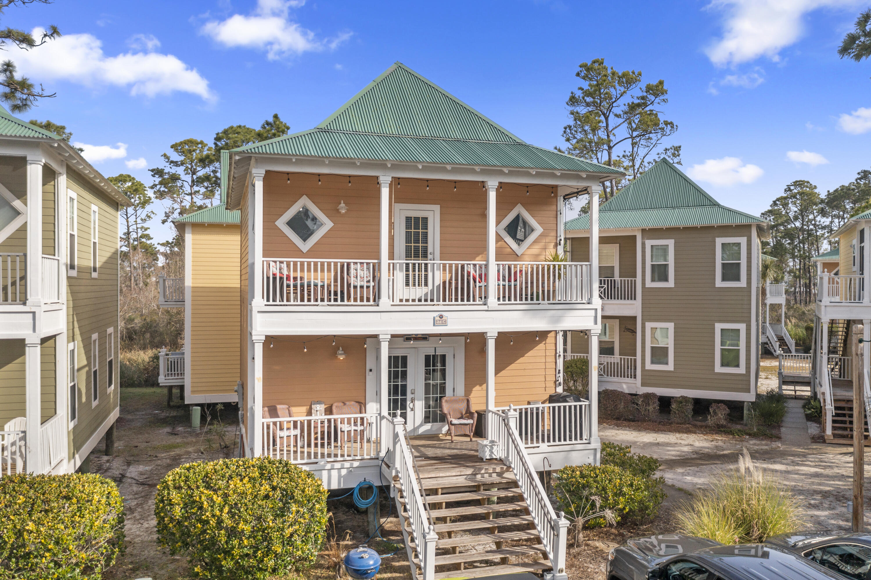 Purple Parrot Village Condo - Residential