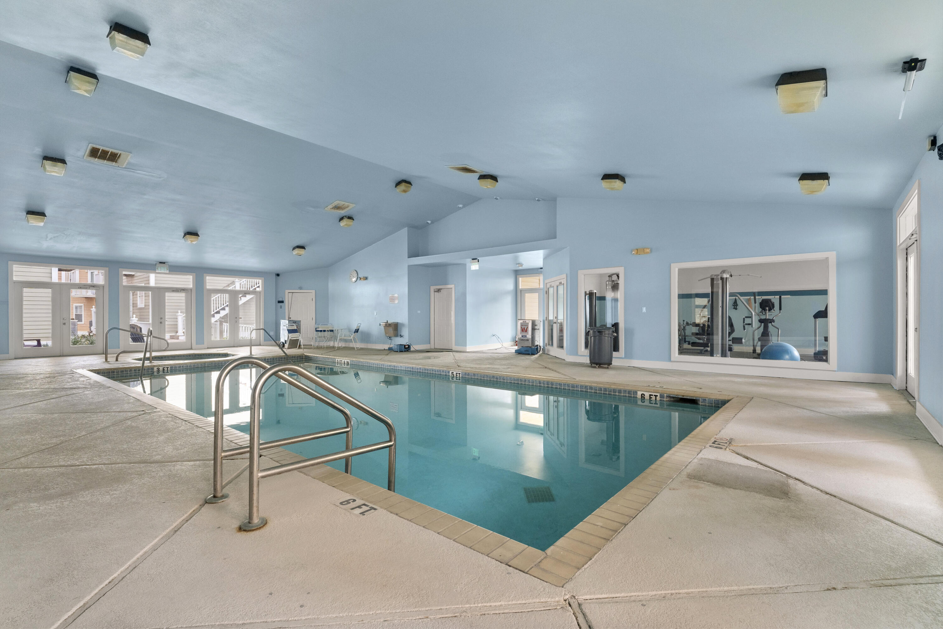 Purple Parrot Village Condo - Residential