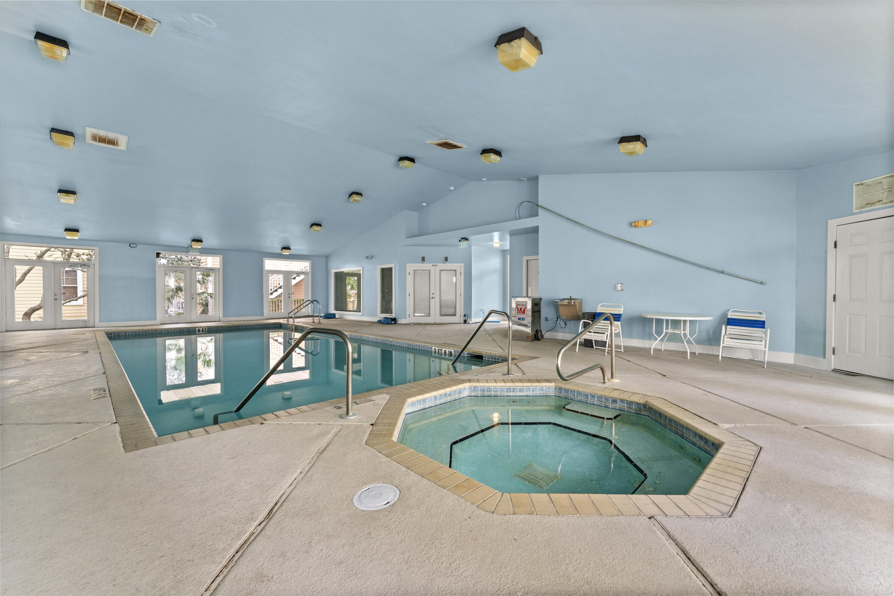 Purple Parrot Village Condo - Residential