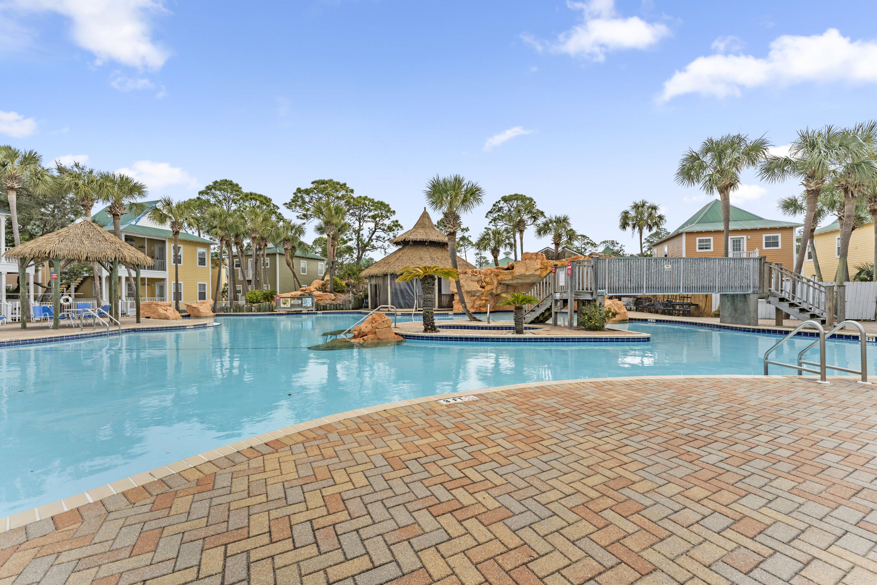 Purple Parrot Village Condo - Residential