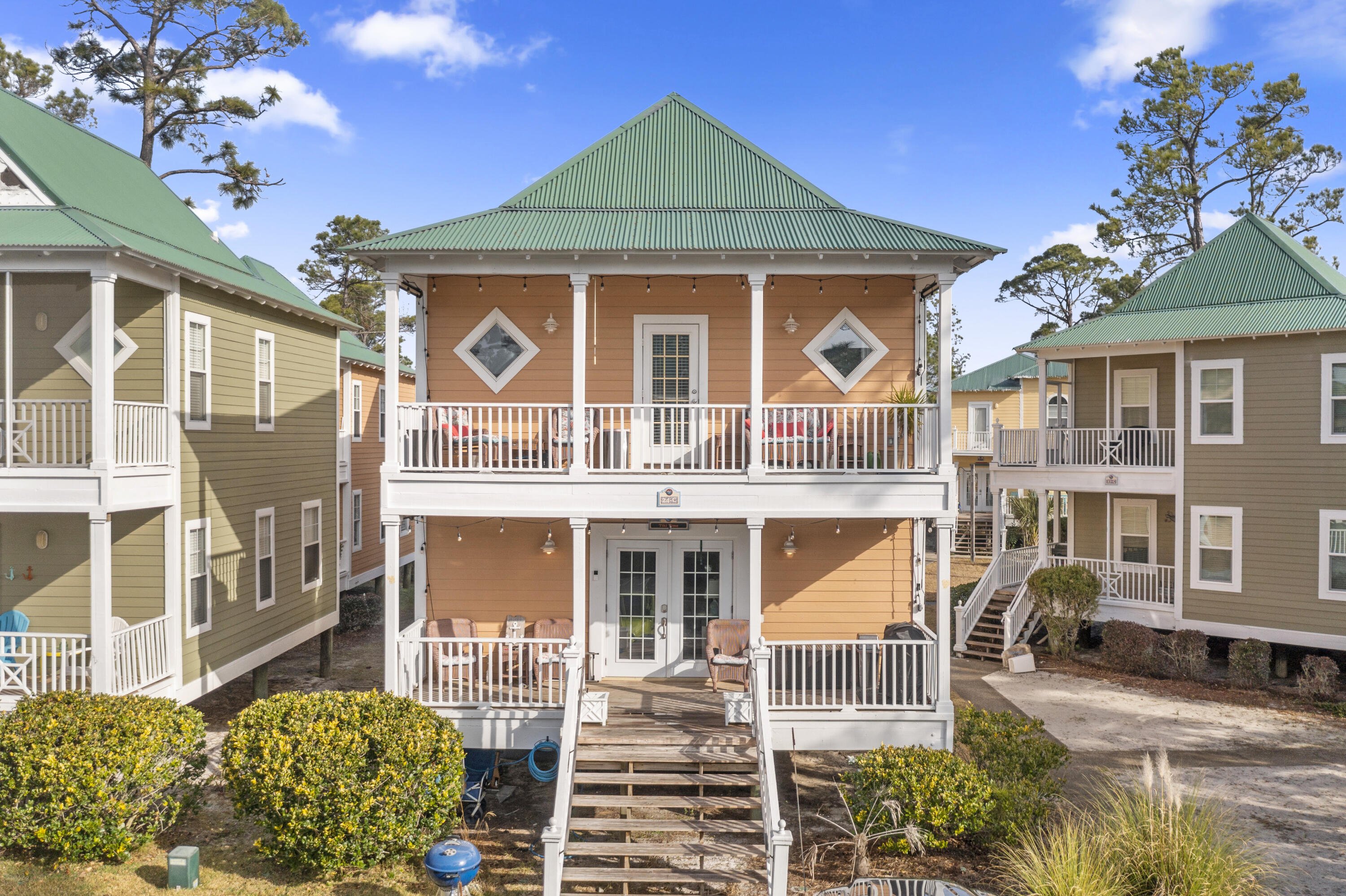 Purple Parrot Village Condo - Residential