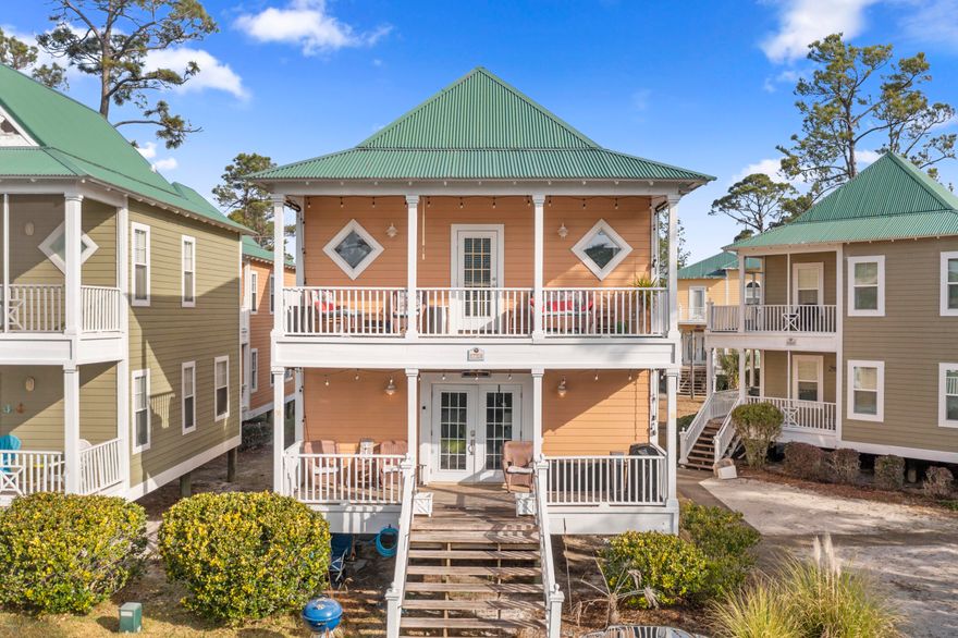 It's TIKI TIME ! Renovated & upgraded 2 bedroom Coastal Cottage is now available in the Purple Parrot Resort. This cottage features a spacious living room and open concept layout on the first floor, including a large kitchen, breakfast bar, and dining area. Beautiful all new ''coastal oak'' laminate flooring throughout the home adds to the beachy feel of this cottage. There is a powder room half bath and washer/dryer on the 1st floor. Second floor features master bedroom, which has it's own 23'x5.5' balcony where you can sit, relax and enjoy the breezes. The guest bedroom is quite large and also features an en-suite bath. This unit has been well maintained and so many updates! Heim Vision doorbell stays. Schlage combo door lock for easy programmable coded entry.