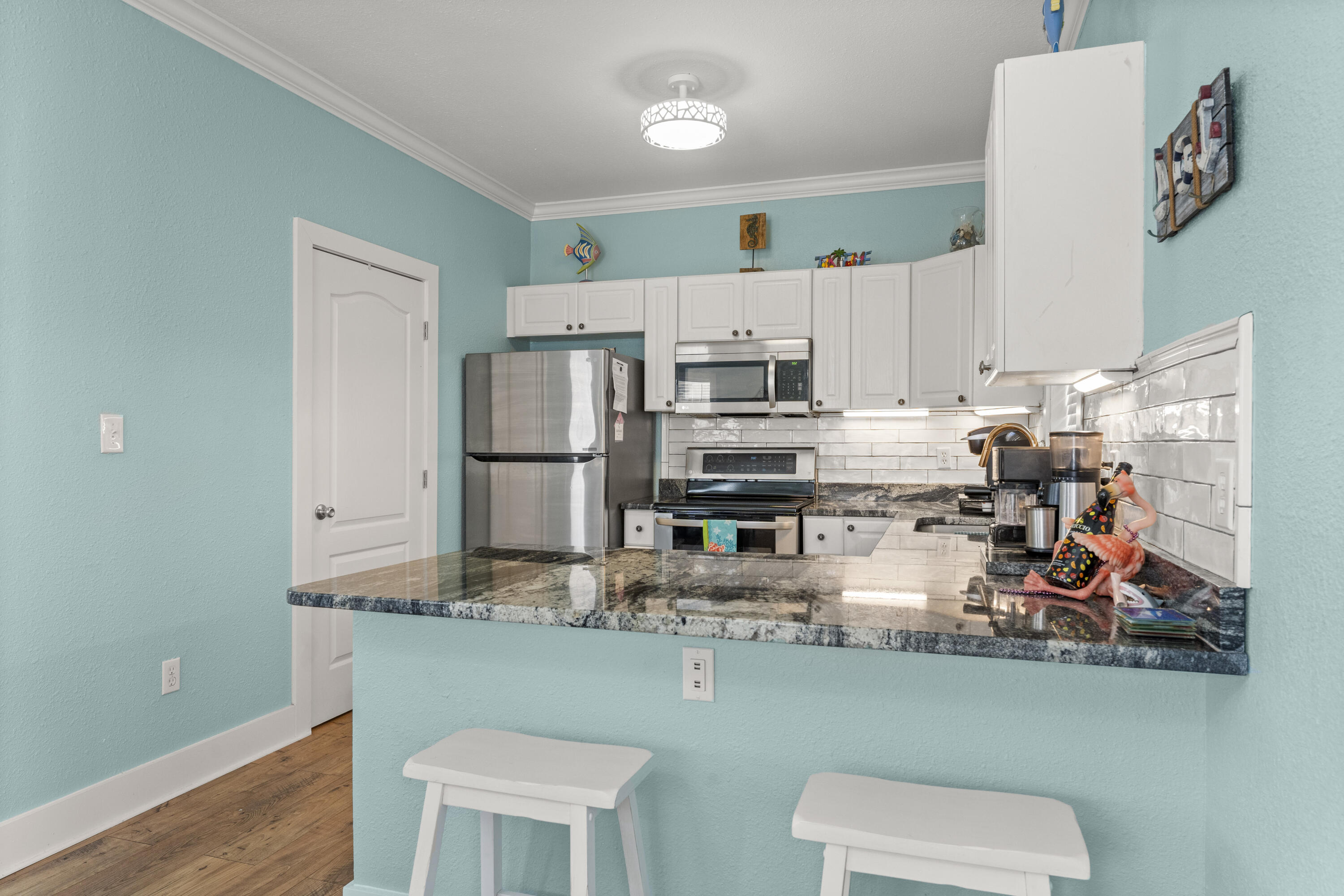 Purple Parrot Village Condo - Residential