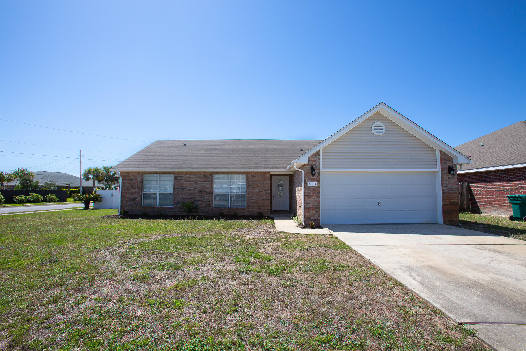 LOOK NO MORE!! This house checks all the boxes! The neighborhood is quiet and family friendly. It is close to the schools, YMCA and beaches. It is a 3/2 with a garage, open floor plan and LARGE backyard perfect for entertaining. The home boasts many upgrades including STAINLESS STEEL SAMSUNG dishwasher, stove and microwave. There is new flooring, updated light fixtures and paint all on a corner lot!! This house will not last long. Call to see today!!