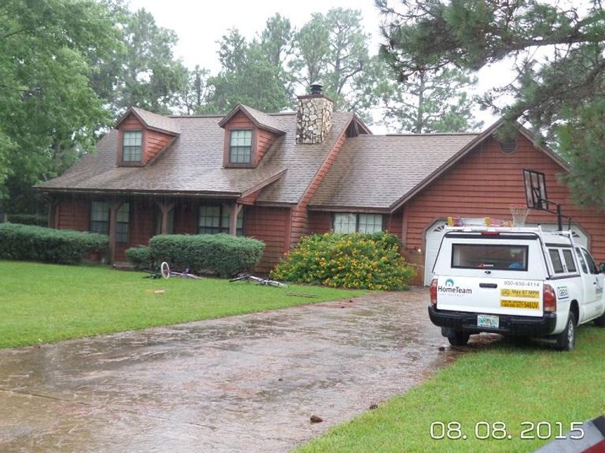 Lovely home on large lot with a swimming pool and screened florida room. This house has a wood burning fireplace. Master bedroom is downstairs and the 2 additional bedrooms are located upstairs. The rent pice includes lawn and pool service.