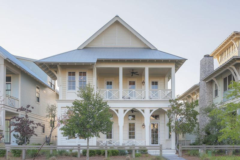 GUARANTEED RENTAL INCOME OF $180,000Spectacular 6 bedroom 6.5 bath home in WaterColor's third phase/Cerulean Landing neighborhood. Custom built Corestruction, Blu Line Studio designed residence, includes an eye for detail and numerous upgraded finishes. In addition to 4 bedrooms in the main house and 1 in the carriage, there are two bunk-rooms on the 3rd level with 4 built-ins per room sharing a Jack & Jill bath. In addition, this level has a 2nd living area, a fitness room and a state of the art theater. All bedrooms have private baths with custom tiles and cabinets. Exposed beams and brick greet you in the entry foyer with soaring ceilings and exposed beams in the living, dining and kitchen areas.