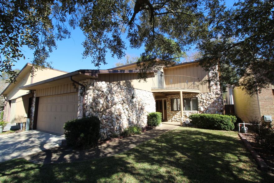 SOPHISTICATED CUSTOM BUILT HOME SITUATED IN THE DESIRABLE DONLABROOK GARDYNS NEIGHBORHOOD! Once the model home and show piece for this easy lifestyle living. Grand living room with high vaulted ceiling, corner fireplace and a beautiful oak open staircase that leads to the upstairs. Formal dining room perfect for entertaining and Anderson doors lead out to the large deck area. Cozy eat- in kitchen with tiled counter tops and lots of cabinets, Jennaire stove with a built-in grill and deep porcelain sink. Inviting breakfast area has windows that span across the front overlooking the yard. Downstairs bedroom has mirrored closet doors and a bath with open vanity with make-up station. Large master bedroom with French doors that lead out to your private balcony. Master bath