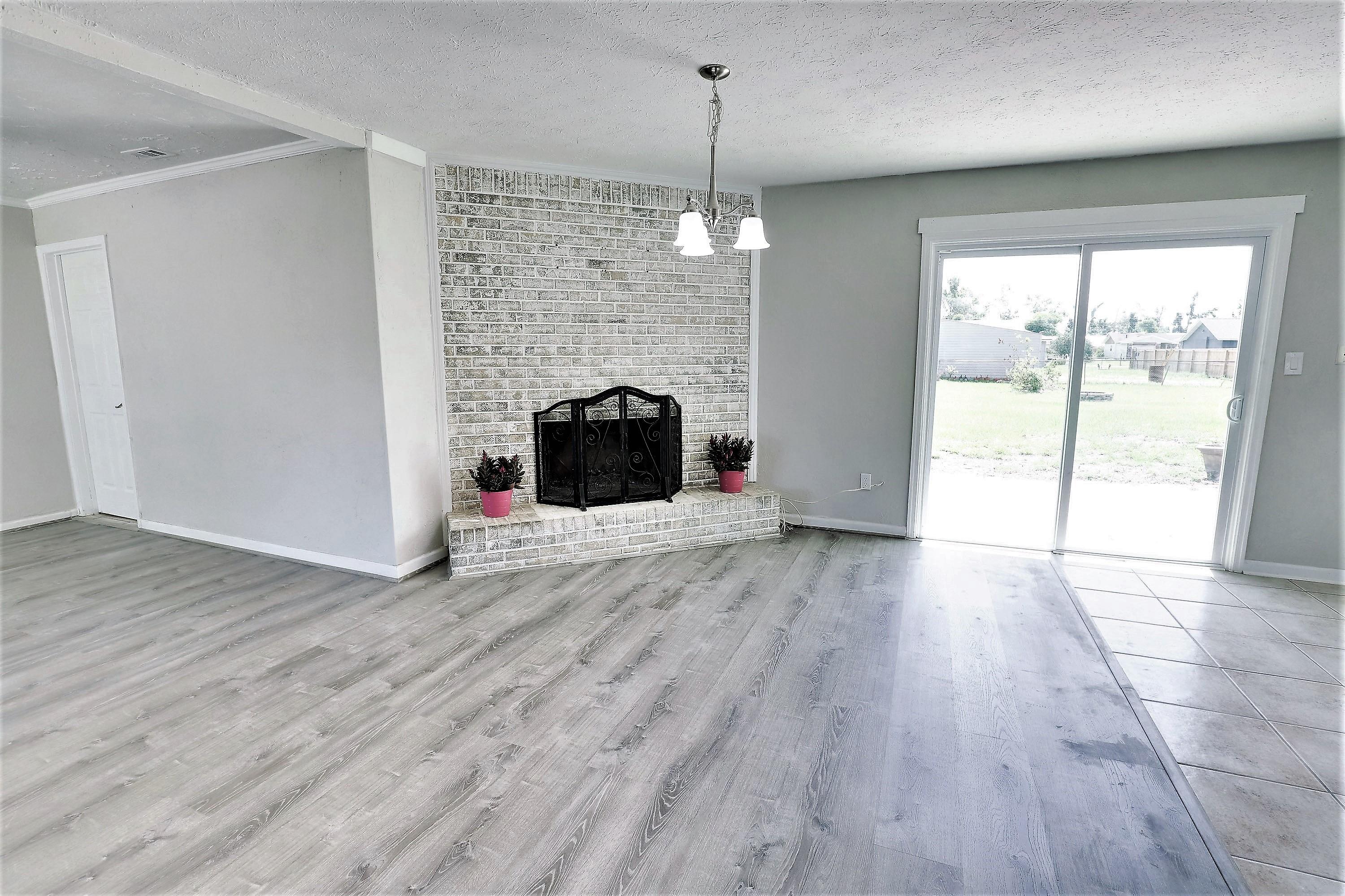 Completely remodeled three-bedroom two bath home in Lynn Haven. All brand-new stainless appliances, Granite Counters, and Life-proof luxury vinyl flooring throughout. Optional stainless microwave over stove hood provided. The home has fresh paint inside and out in neutral color, on a large corner lot with room for a pool, garage/workshop. Lot can be divided and is accessible by two roads. Bathroom vanity, fixtures and plumbing are new. Blinds convey, drapes do not convey. Owner is offering $2500 toward closing or can be used for fence or further customization.