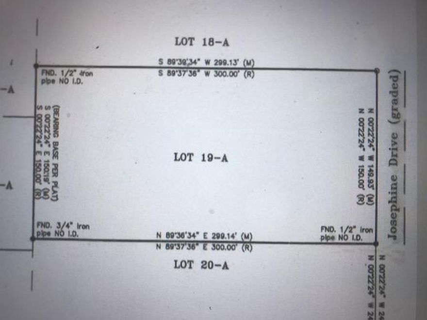 This is a great buy on a 1 acre lot located just minutes outside city limits. Lightly wooded lot with beautiful mature trees. Great home site to build or have a manufactured home installed. Public water is available on this street, but tap fee will need to be paid.