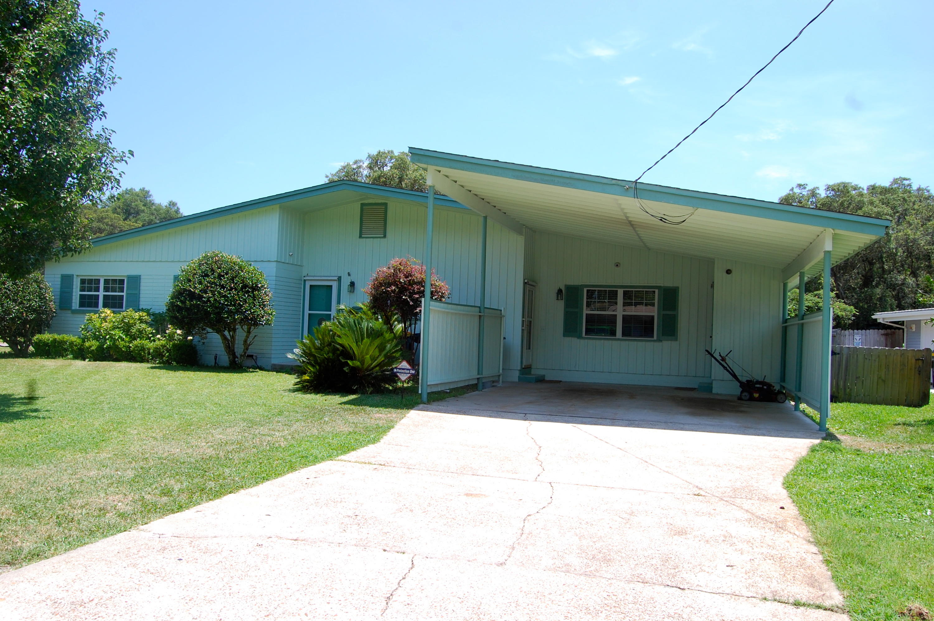 Location! Exceptional home located in the heart of Fort Walton Beach! 44 Waynel is a 4 bedroom, 2 bath home, new stainless steel appliances, tile flooring throughout kitchen and foyer, newer carpeting throughout main living areas. This home has a security system and outside cameras that convey with the property. The exterior offers a shed with electricity and a large, fenced in backyard totaling to .31 of an acre! This home is within close proximity to area dining, shopping, and attractions, as well as minutes from Eglin Air Force Base. INCLUDES HOME WARRANTY