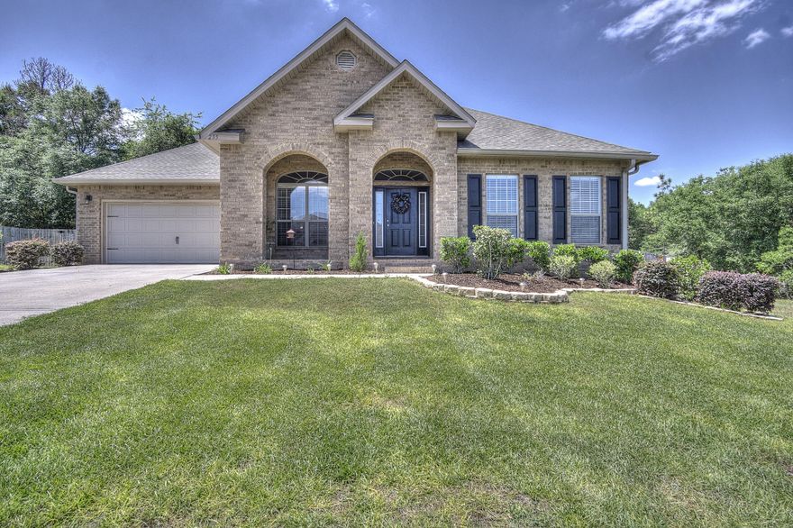 On the north side of Crestview is a beautiful contemporary style home in the desired neighborhood of Liberty Oaks. This all brick home has a fabulous 5 bedroom 3 bath floor plan. Tile floor throughout the kitchen and pantry. Carpet throughout the main living areas and bedrooms. All appliances convey in the well appointed kitchen and there are plenty of cabinets with lovely glass backsplash and a walk-in pantry. There are 2 bedrooms and 1 full bath on either side of the open living area. The secluded Master Suite has a great master bath with double vanity, garden tub, separate shower and a huge walk-in closet. Master also has a private entrance to the covered patio in the large privacy fenced back yard.