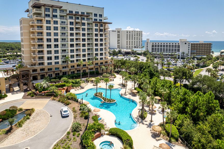 *SELLER WILL PAY HOA DUES THROUGH THE END OF THE YEAR* Investors and second-home buyers, this rare first-floor walk-out condo offers the perfect blend of versatility, convenience, and rental potential.  Just steps from the white sandy beaches of the Emerald Coast, this 2-bedroom, 2-bath lock-off provides multiple leasing options, making it an ideal investment opportunity. The lock-off design allows you to rent it as a full 2-bedroom, 2-bath condo, a 1-bedroom, 1-bath unit with full living space, or a separate studio for private short-term stays. Enjoy the ease of ground-floor living with no elevators--simply walk out to resort-style amenities, lush landscapes, and direct beach access. Whether you're seeking a rental property or a low-maintenance vacation retreat, this condo delivers.