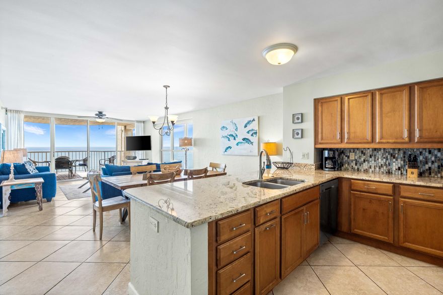 This 3 bedroom, 3 bath corner unit provides breathtaking gulf views through floor-to-ceiling glass in the living area. Newly remodeled, it boasts a kitchen with mosaic tile backsplash, granite counters, stainless steel appliances, and tile floors throughout. Premium electric shades enhance the living and master areas. Gulfside amenities include a pool, hot tub, and fitness center. Hidden Dunes, a 27-acre gulf-front paradise, sits on the south side of Highway 98. The resort features range of resort amenities, including 6 tennis courts with a pro shop, pickleball courts, a playground, 24-hour gated security, gas grills, a stocked fishing pond (catch and release), and newly added electric vehicle charging stations and about 500 feet of private beachfront with seasonal beach servic