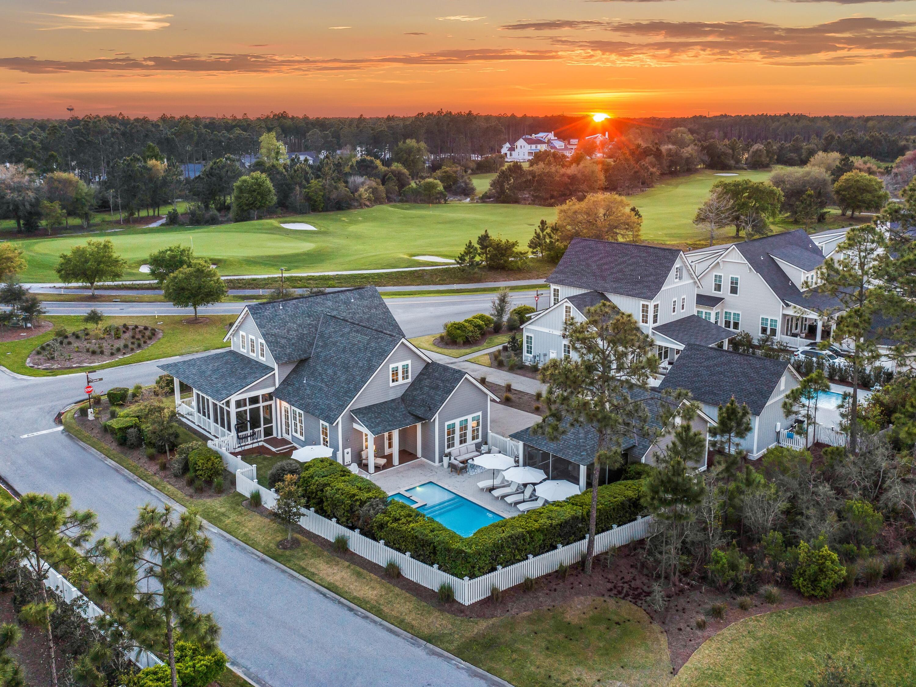 The ideal blend of privacy, golf course views and close proximity to the 30A lifestyle come together in this serene WaterSound Origins home on a large corner lot with a sheltered backyard oasis. Offered in like-new condition, this four-bed, four-and-a-half-bath home features thoughtful design and finishes in a rental-restricted community. Inside, the expansive living room is flooded with natural light thanks to a generous amount of windows. Twelve-foot ceilings and wire-brushed hardwood floors lead the way to the spacious kitchen, which offers an oversized island, abundant cabinetry with soft-close hardware, Bosch and Thermador appliances and quartz countertops.