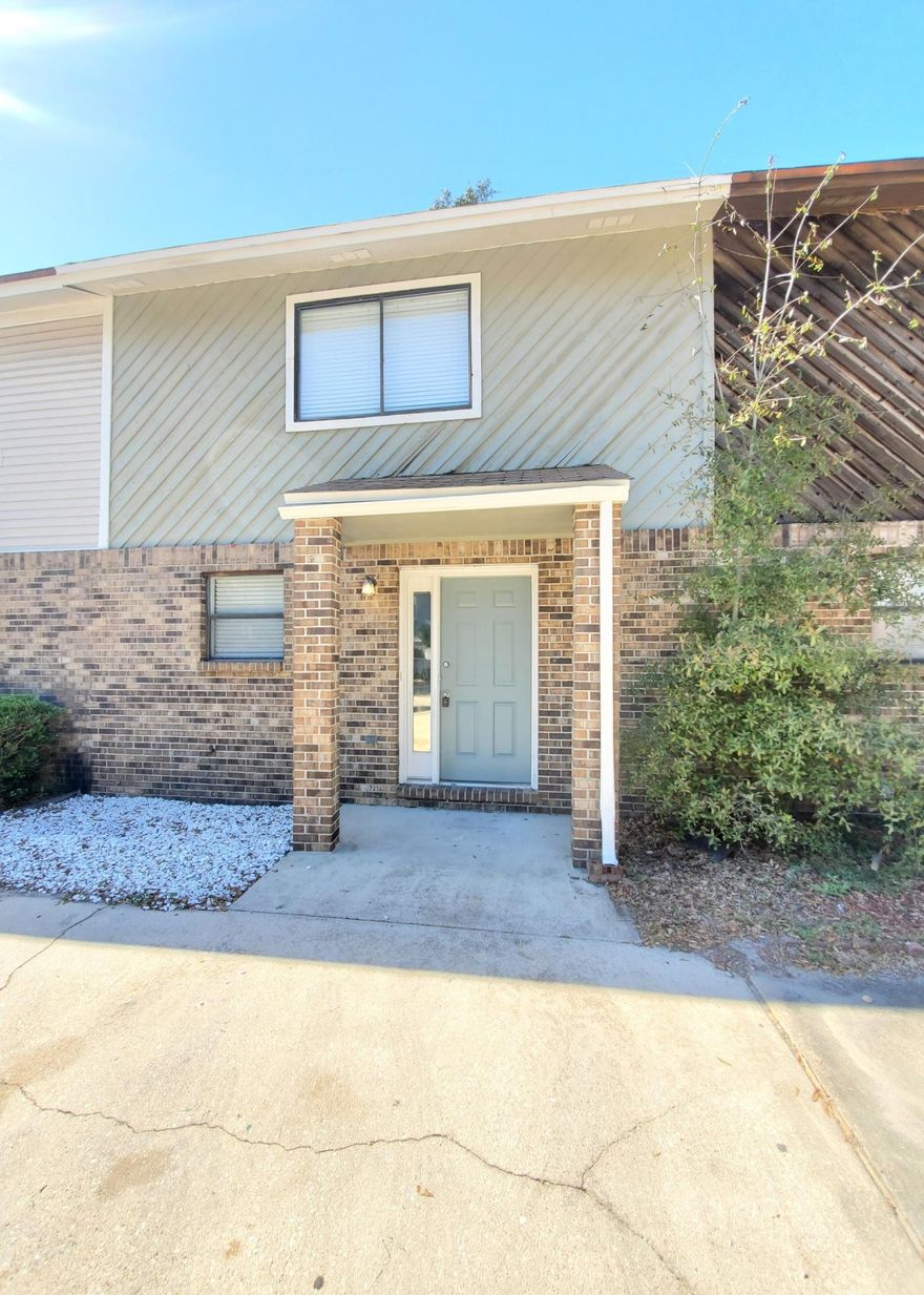 Welcome home! Adorable 2 bedroom 1.5 bath townhome for sale in Fort Walton. This property has been freshly painted and recently upgraded. New stainless steel appliances, new carpet, and NEW ROOF! (On order). This cozy unit features a large brick fireplace, spacious indoor laundry, tall ceilings in the living room, good sized dining area, and roomy kitchen with lots of countertop space. Fenced in back patio area with pergola. Both bedrooms are located upstairs. This townhome would make the perfect starter home or income producing property! Vacant and easy to show.