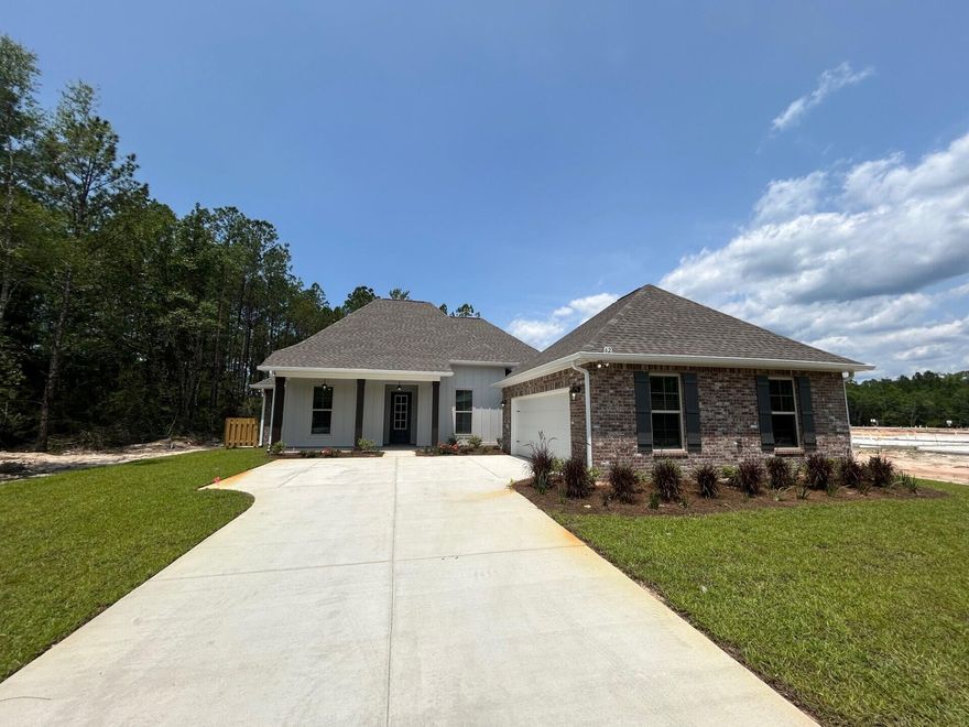 The RENOIR IV I in Bird Song at Hammock Bay community offers a 4 bedroom, 3 full bathroom, open design with flex space. Upgrades added (list attached).  Features: double vanity, garden tub, separate custom tiled shower, and walk-in closet in master bath, kitchen island, walk-in pantry, boot bench and drop zone in mudroom, covered patio, crown molding, recessed lighting, smart connect WIFI thermostat, smoke/carbon monoxide detectors, landscaping package, architectural 30-year shingles, flood lights, and more!Energy Efficient Features: water heater, electric kitchen appliance package, vinyl low E windows, and more! Energy Star Partner.
