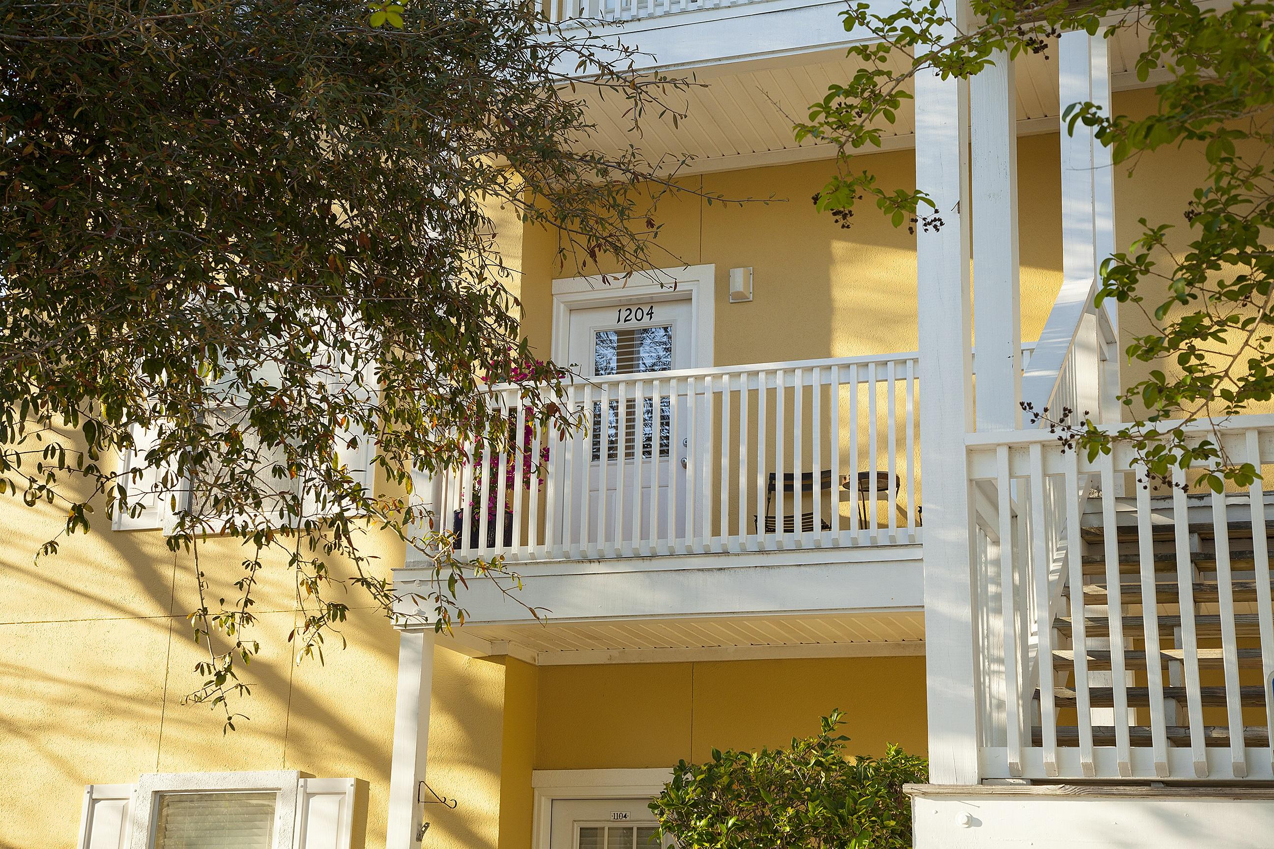This quiet, gated community is perfectly situated at Eastern Lake between Rosemary and Seaside. Overlooking Pt. Washington State Park, this Heron's Watch condo features a private covered balcony with forest views. Inviting, accurately describes this wonderful two bedroom - two bath unit. The kitchen is open to the living and dining areas. The balcony is just off the living room and provides a great place to relax. The master bedroom has plenty of space and the unit has lots of natural light. The Old Florida fish House is within walking distance and you can launch your kayak or YOLO board from a private Lake access right next door and paddle to the beach! This condo would be a great residence, vacation home or rental! Move in ready, call to see it today