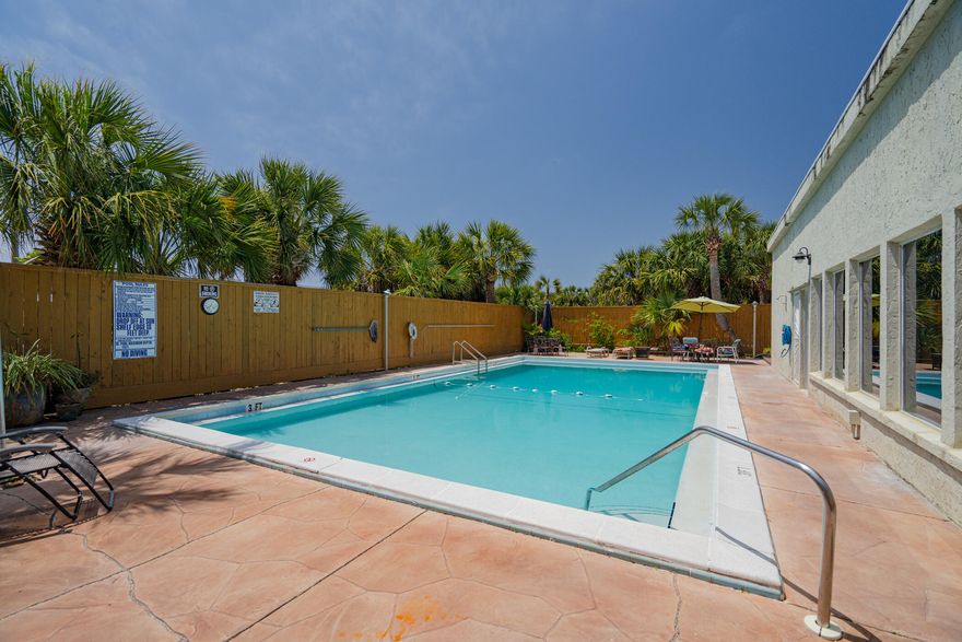 You need to see this wonderful townhouse that's only a short walk to the beach. This property had a total renovation in 2017. Property was down to the studs. Replaced, wiring, hvac, water heater, drywall, all cabinets, bathtubs, sinks, fixtures, flooring and added a full bath. Turned outdoor  storage into indoor laundry room with access off the kitchen. Part of balcony, above laundry room was made into walk in closet. Roof was also replaced and privacy fence. This is absolutely the best deal on the island!Buyer to verify all dimensions and important information about this property.