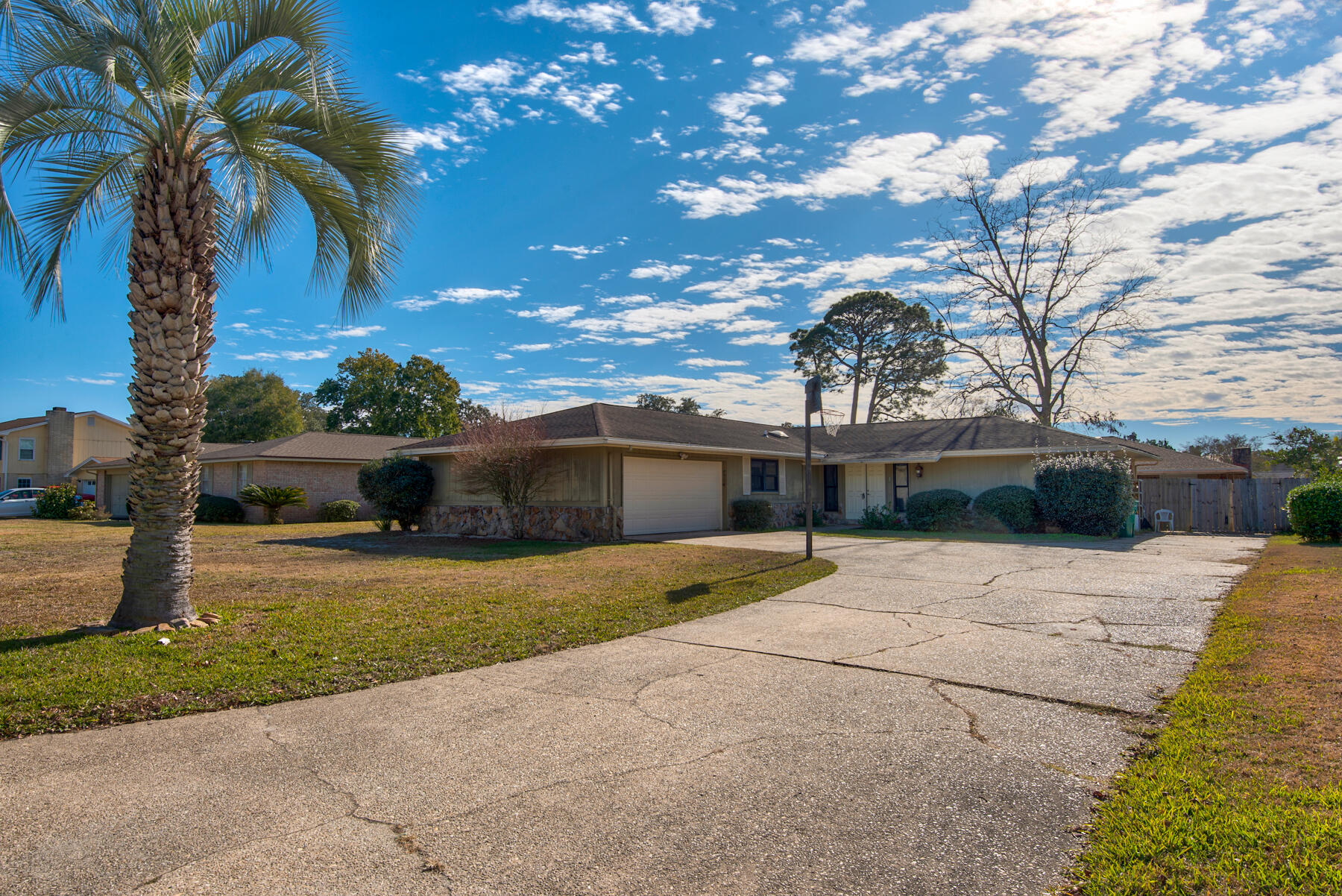 This 4 bedroom, 2 bath home needs some TLC but will make a wonderful investment for a family or investor. Nice split bedroom floor plan, screened porch, .25 acre lot,  great neighborhood and location. Close to military bases and all things Emerald Coast! *New kitchen appliances will be installed January 22nd.